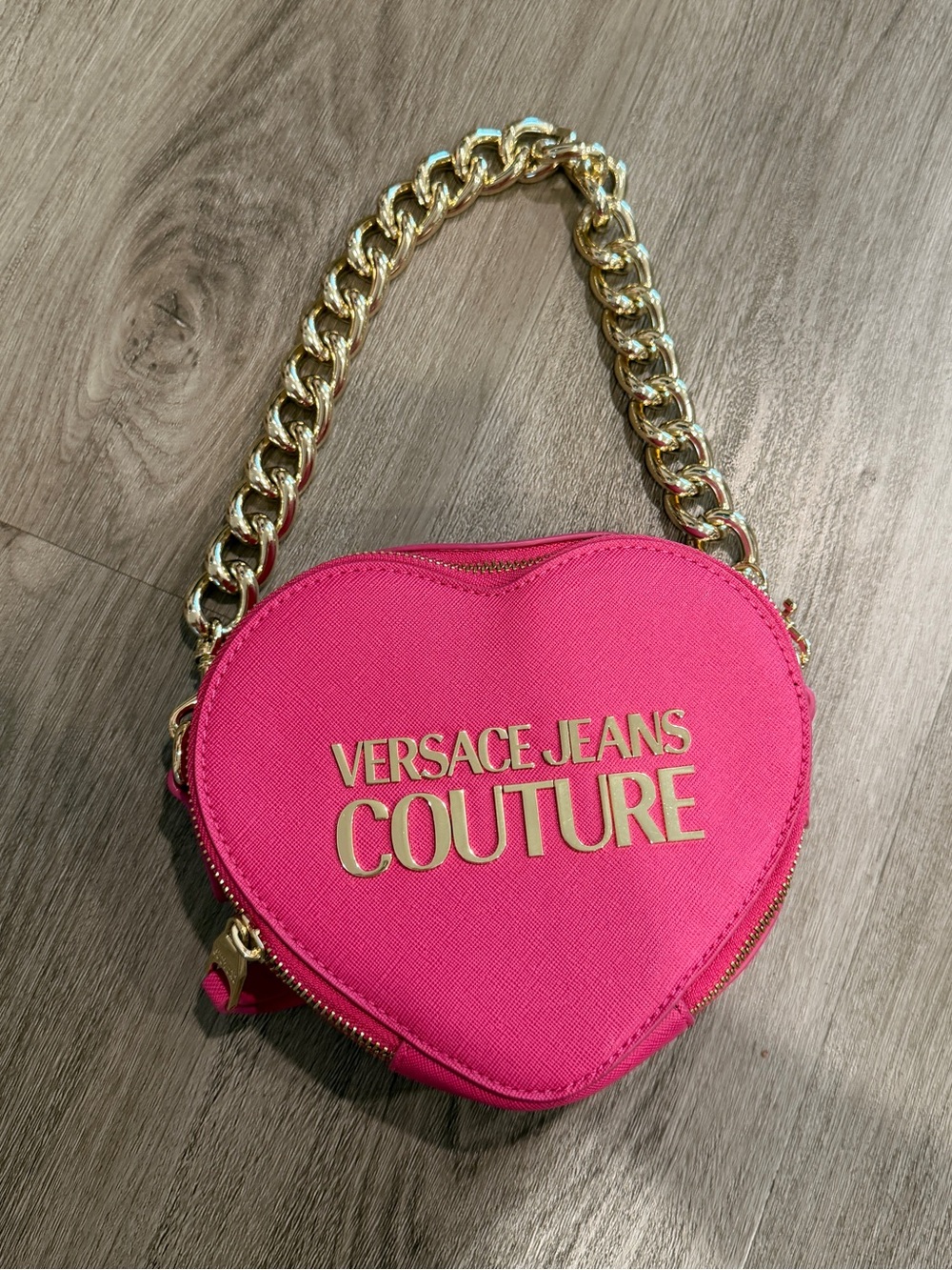 Versace Jeans Couture Pink Heart Shaped Bag
Crossbody bag